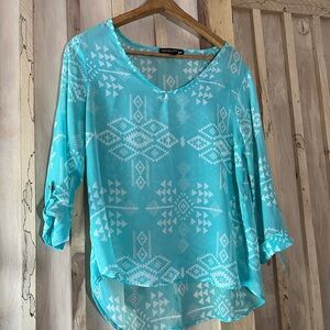 Juniors sheer Aztec print top